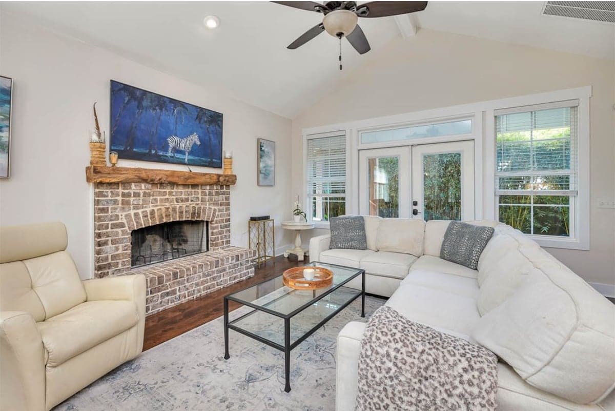 Living room with coastal seating and natural light